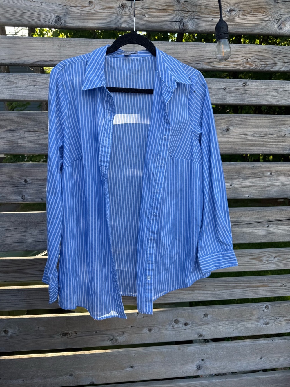 Woman Within Blue and White Striped Button-Down Shirt